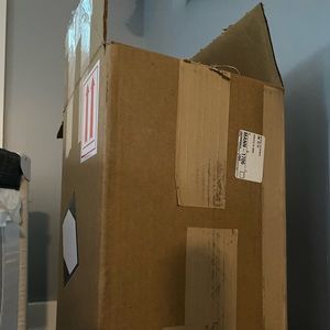 Chelsea’s box two purses and clothes